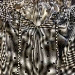 Black polka dot flowy top